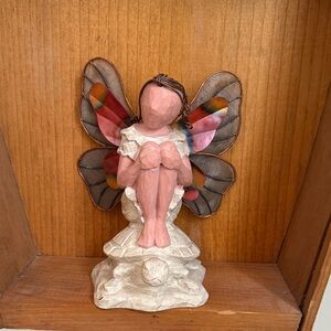 Enchanted Wings Fairy Figurine with Colorful Wings.